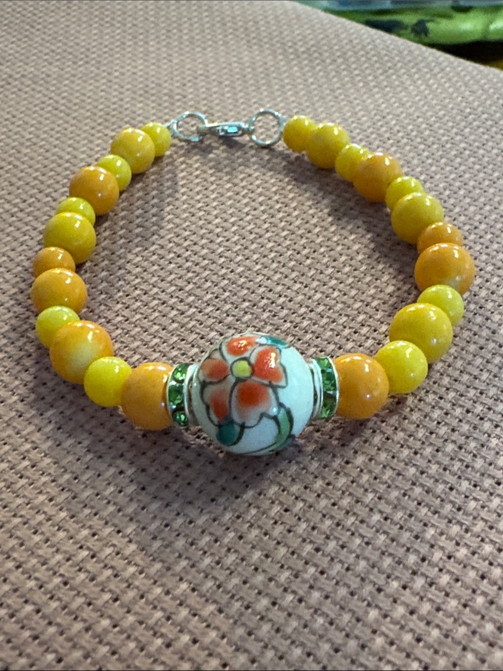 Artisan Yellow and Orange Beaded Bracelet with Floral Ceramic Accent